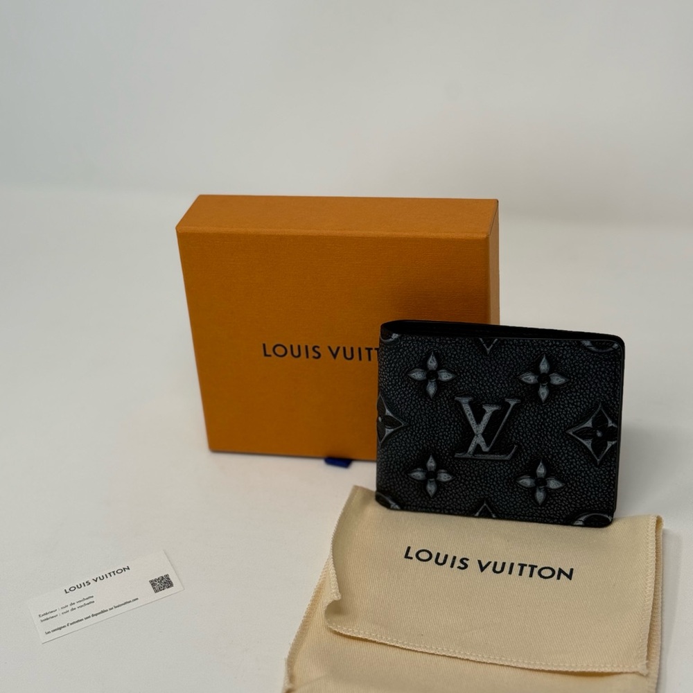 Louis Vuitton Monogram Faded debossed Leather Black Slender Wallet - Picture 1 of 7